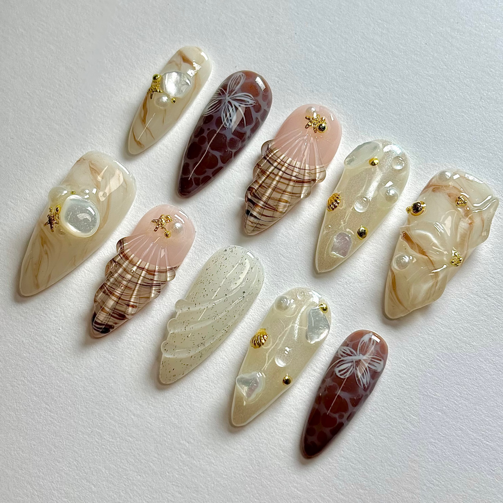 Decorative nail art designs on a white background